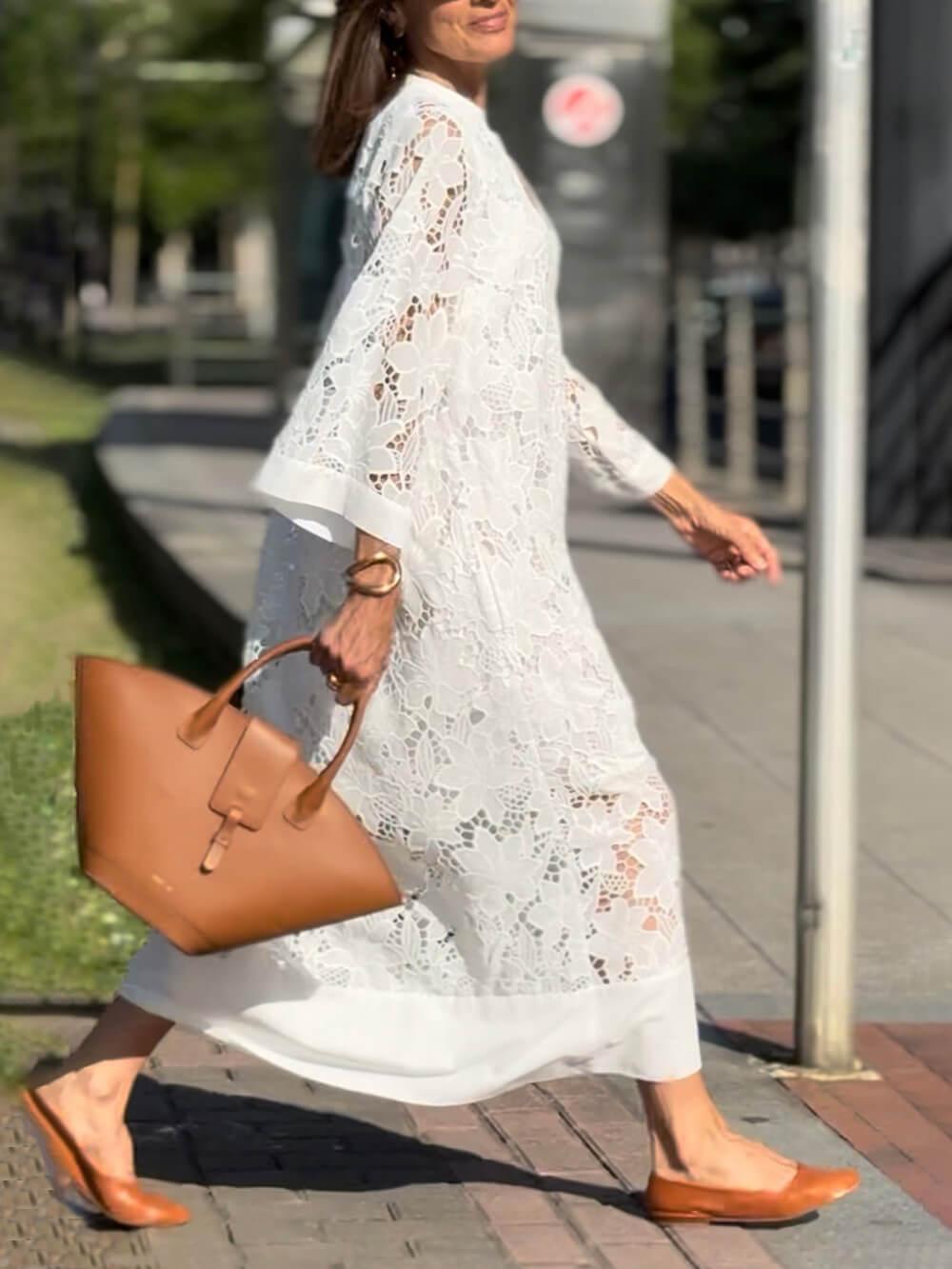 Maddalena | Blommig midiklänning med V-ringning och strandglamour