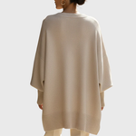 Livia | Rymlig ponchotröja