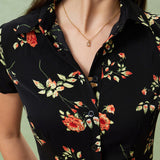 Kriemhild | Svart blommig midiklänning