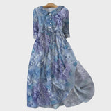 Gesine | Långklänning med blommor i skymningstoner