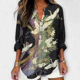 Ines | Blus med tranor och blommor