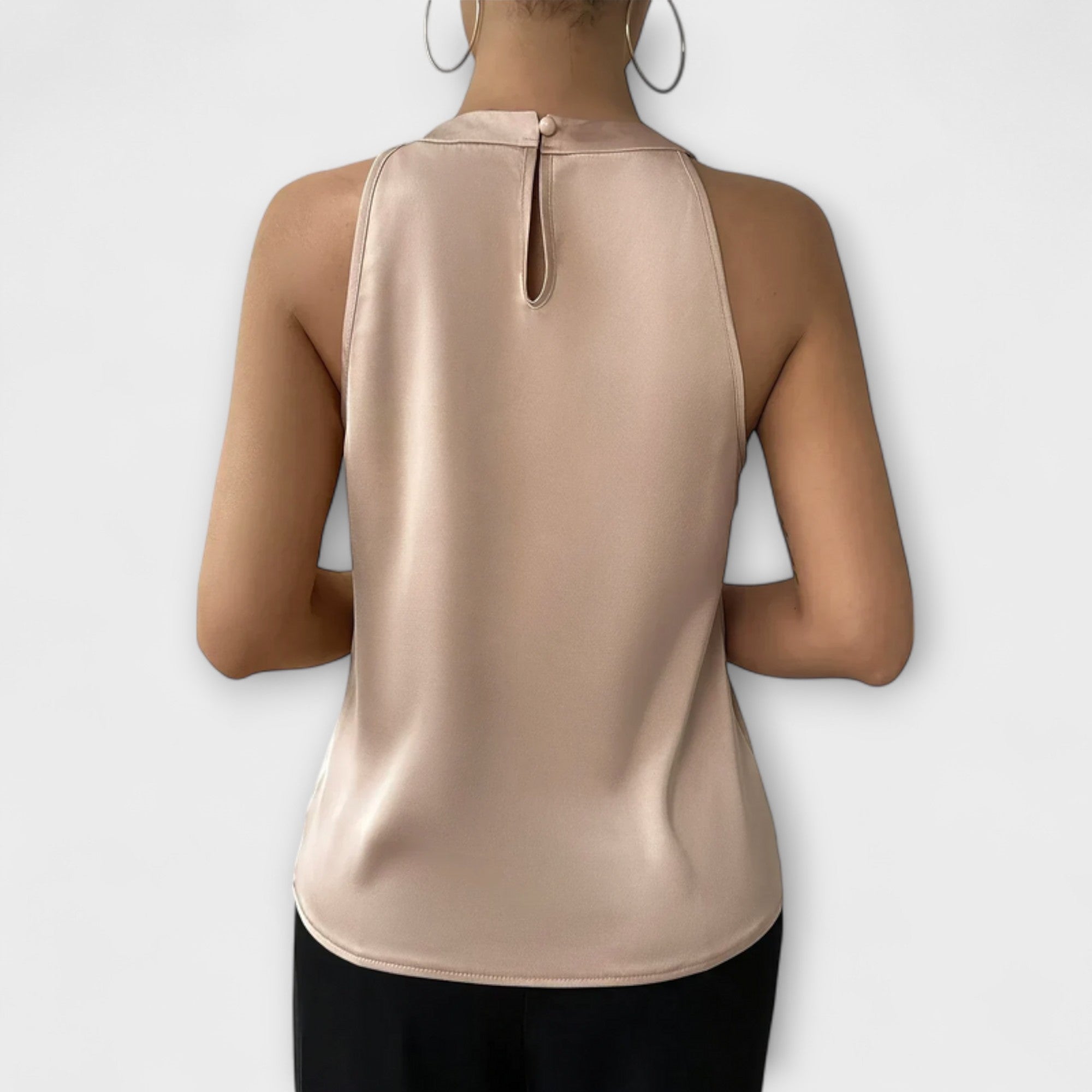 Henriette | Ärmlös blus med halterneck och veck