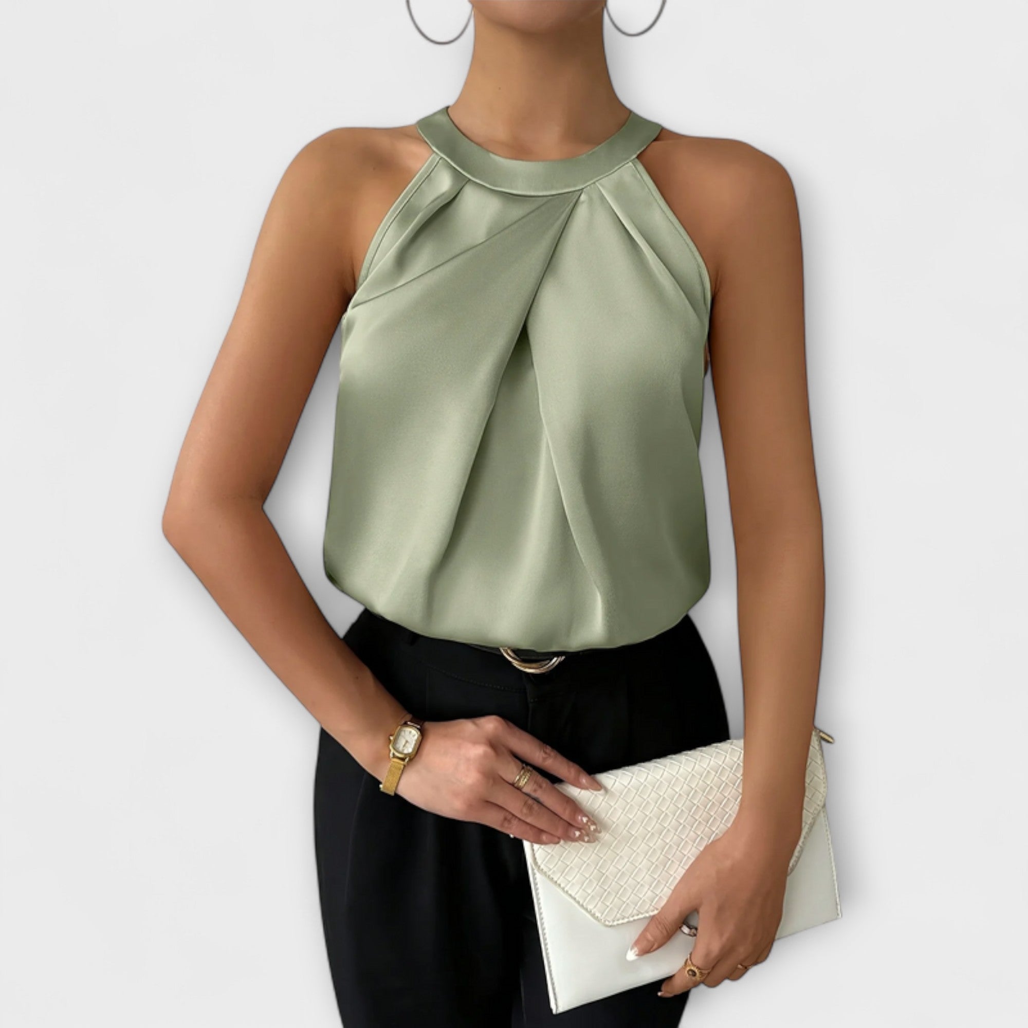 Henriette | Ärmlös blus med halterneck och veck