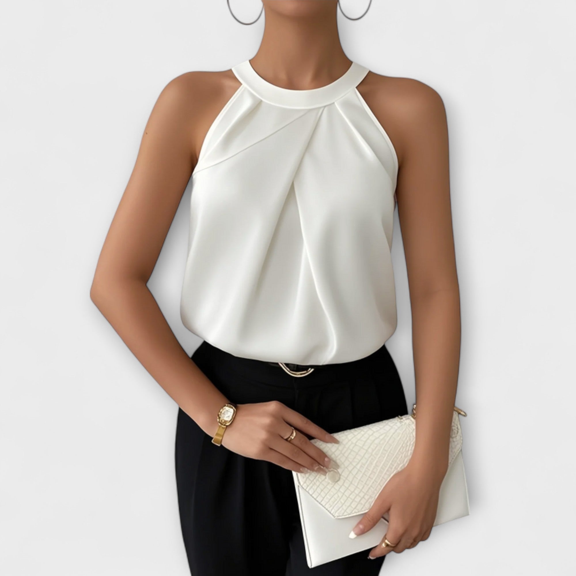 Henriette | Ärmlös blus med halterneck och veck
