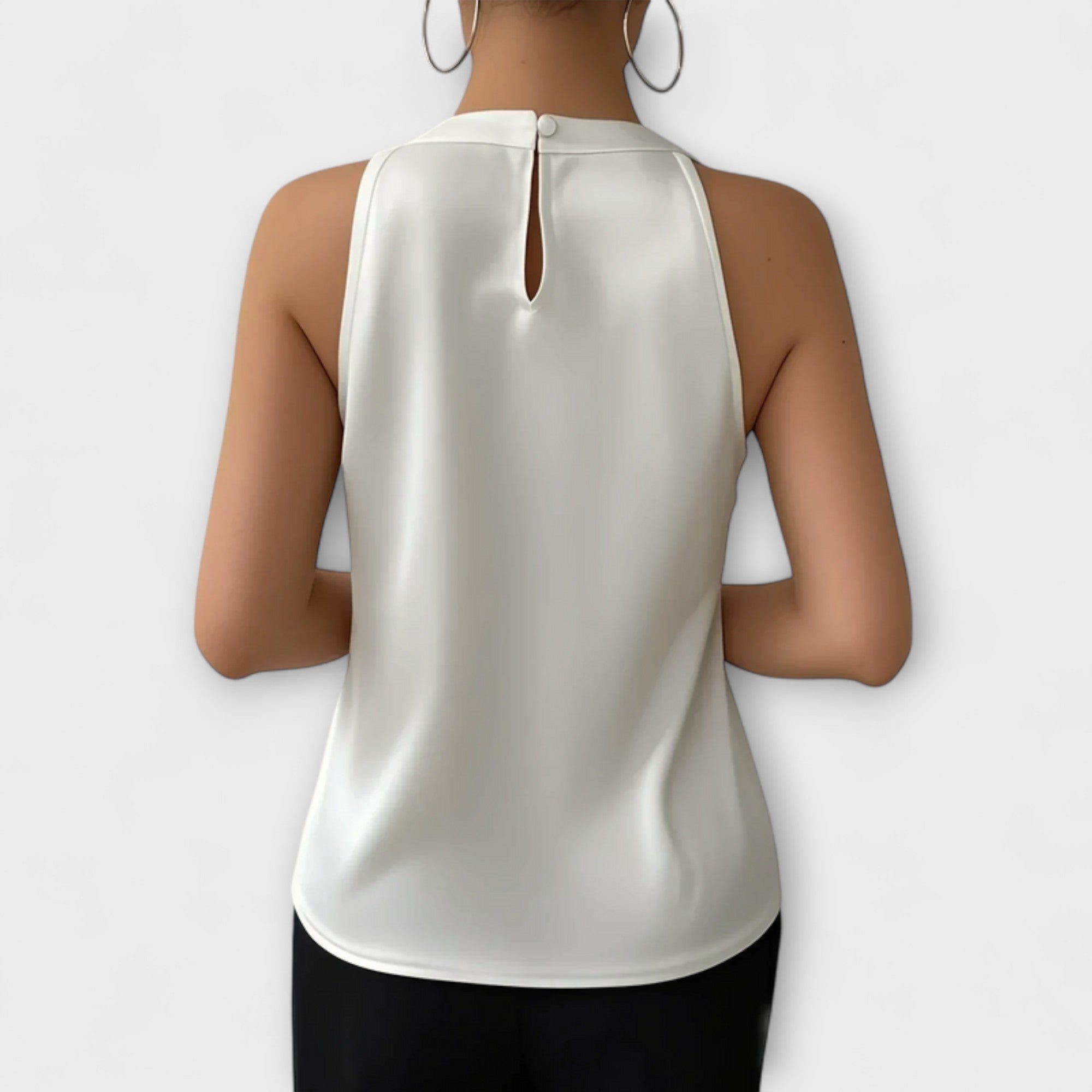 Henriette | Ärmlös blus med halterneck och veck