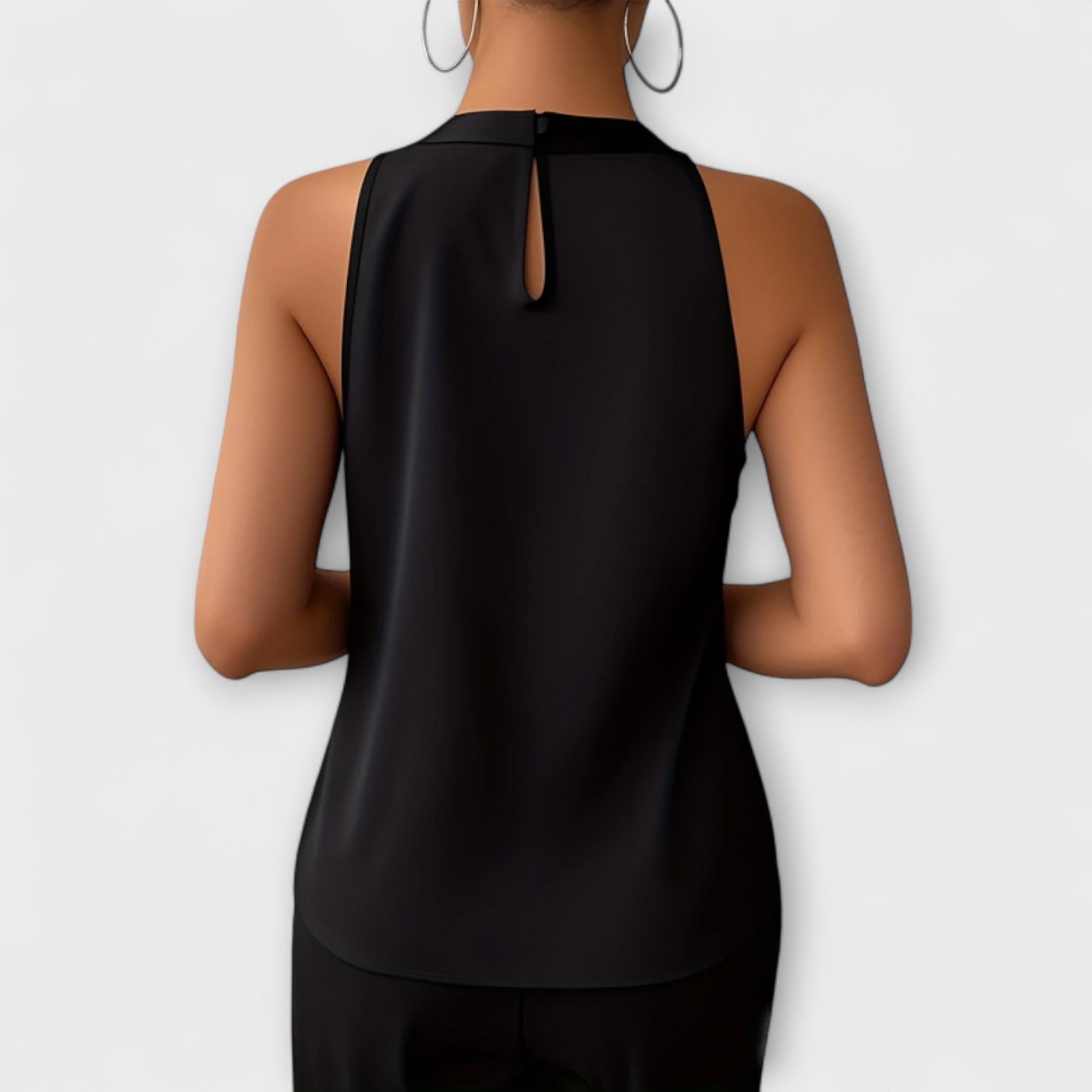 Henriette | Ärmlös blus med halterneck och veck