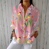Friedl | Blus med trädgårdens vårblommor