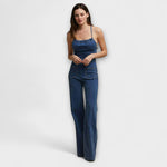 Stefanie | Utsvängd denim jumpsuit med knytdetalj