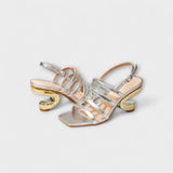 Lara | Glänsande metalliska slingbacks