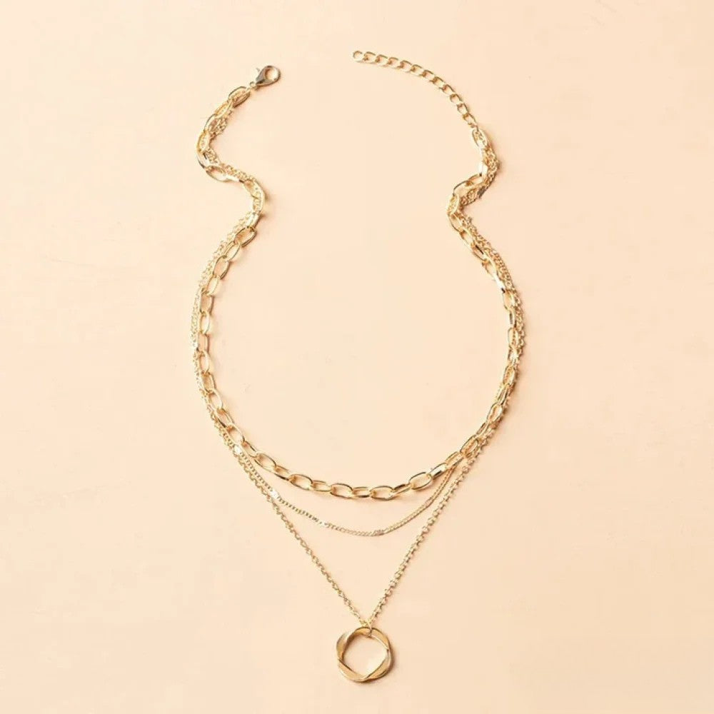 Kirsten | Guldfärgat halsband i flera lager med retrostil