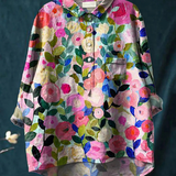 Christina | Blus med färgglada vårblommor