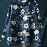 Pia | Blus med konstnärligt blommönster